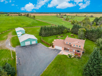 Country property with barns & horse stalls $1,399,900
