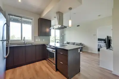 Simply turn the key and be home!... in this Fully Furnished, Top Floor Suite with downtown skyline v...