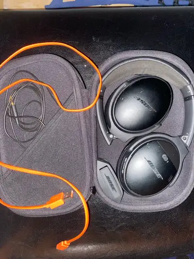 Noise canceling, good condition, comes with case, charger and audio cord. Has great battery life.