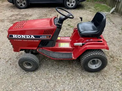 Honda HT3813 Lawn Tractor. Liquid cooled, 2 cyl ,13 HP engine. Runs well. 42" mower in very good con...