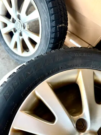 For sale: Bridgestone Blizzak WS80 205/55/R16 winter tires with Mazda alloy rims from Mazda3. Sold v...