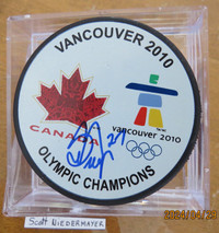 Vancouver 2010 Olympic Champions -Sign puck by Scott Niedermayer