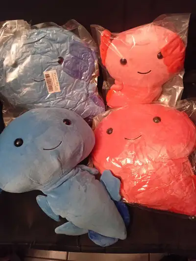 Adorable axolotl plush toy. Soft and cuddly. Medium and large sizes. See images for sizes and colour...
