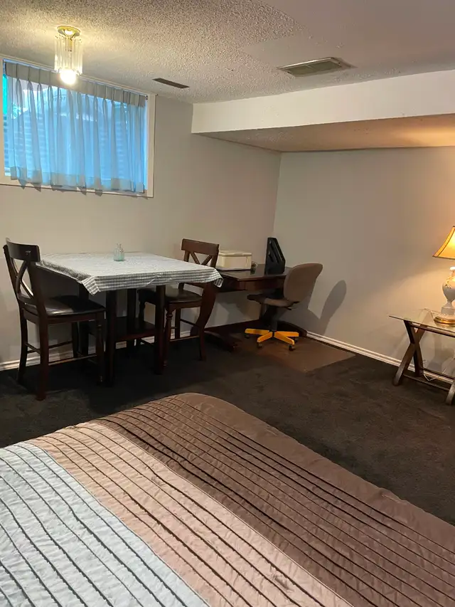 Furnished Basement suite, Woodbine SW. Ready to move in.