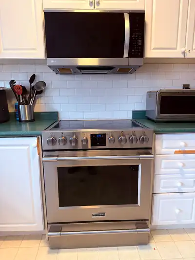 Kitchen Appliances for Sale (LG Microwave & Frigidaire Stove), View more