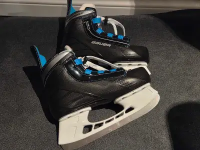Bauer Prodigy hockey skates. Basically new condition. Youth size: 12-13R