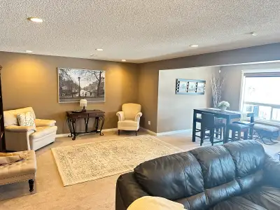 **Experience Luxury in Okotoks!** Escape the ordinary and indulge in your very own Executive Walkout...