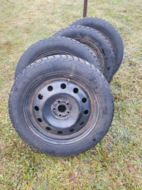 Studded tires with rims. 225/55R17
