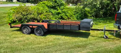 Flatbed trailer double axle new lights and wiring , tool box on front.