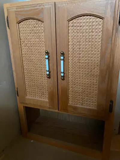 Oak bathroom cabinet. Solid build, Cabinet is meant to be hung on wall. Pet free, smoke free home. T...