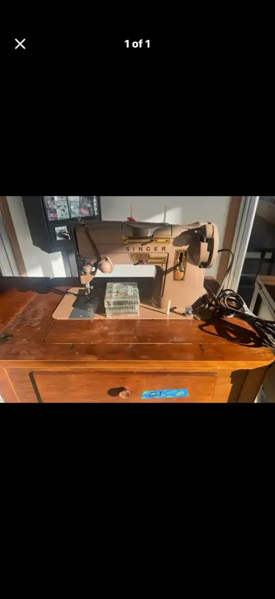 Singer Sewing Machine with Cabinet, View more