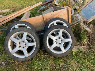 4 Mercedes AMG rims with snow tires 225/4517 $280. Text 9057302112 Grimsby