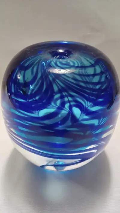 A NICE VINTAGE ART GLASS MADE INTO A OIL LAMP. IT IS SIGNED. THE BASE IS SMOOTH AND POLISHED SHINNY...