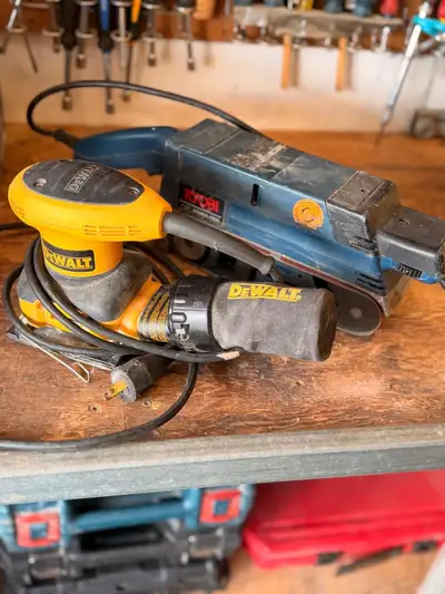 Set of 2 sanders in great working condition. Includes DeWalt orbital sander with dust bag and Ryobi...