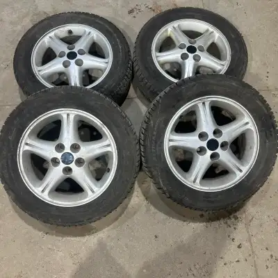 Set of four 205/60R16 General Altimax Arctic 12 snow tires with about 70% tread remaining. Mounted o...