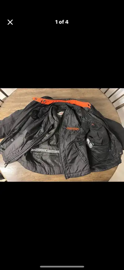 I'm offering a Harley Davidson FXRG jacket, size small, that's perfect for hitting the open road. Th...