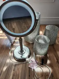 Lighted makeup mirror with magnification
