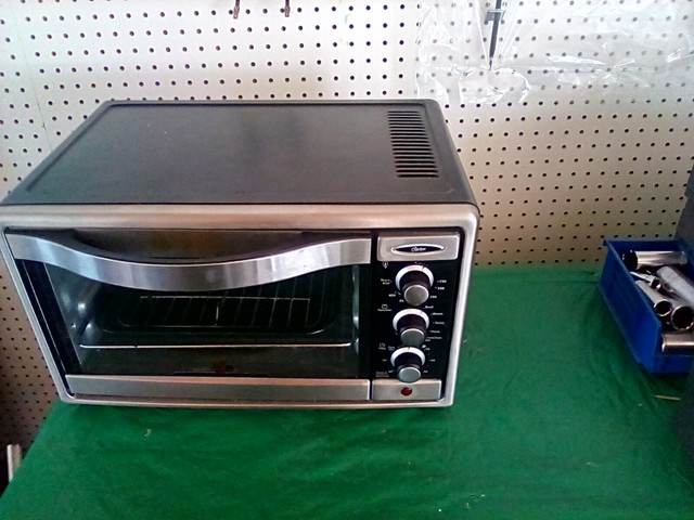 OSTER  TOASTER  OVEN in Toasters & Toaster Ovens in Trenton