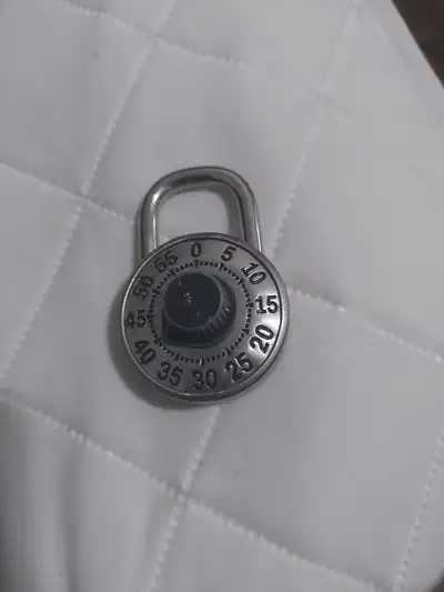 This combination lock is in used condition. It's ready to keep your stuff safe and sound. Works grea...