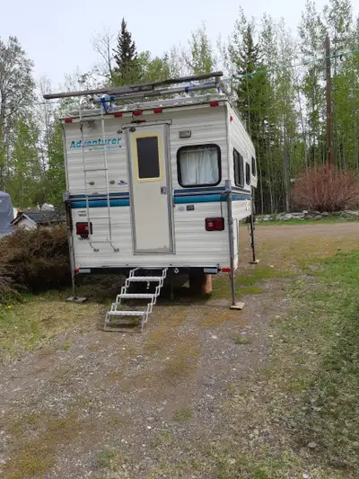 -10' Adventurer Camper c/w boat top loader. -Well-maintained & clean -Stored in RV shed -All applian...