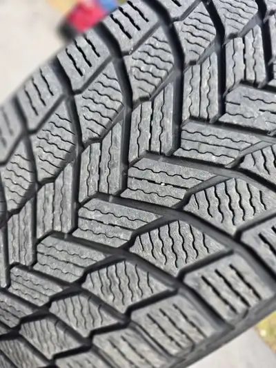 Selling a full set of Michelin winter tires (235/65R18) mounted on original Toyota rims. They were o...