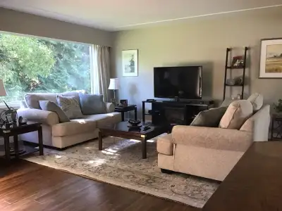 Welcome to our family home! This spacious residence features a comfortable living area, a functional...