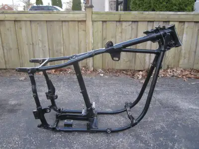 This is a genuine Harley Davidson Shovelhead frame with a Delkron VIN numbers on the frame. The fram...