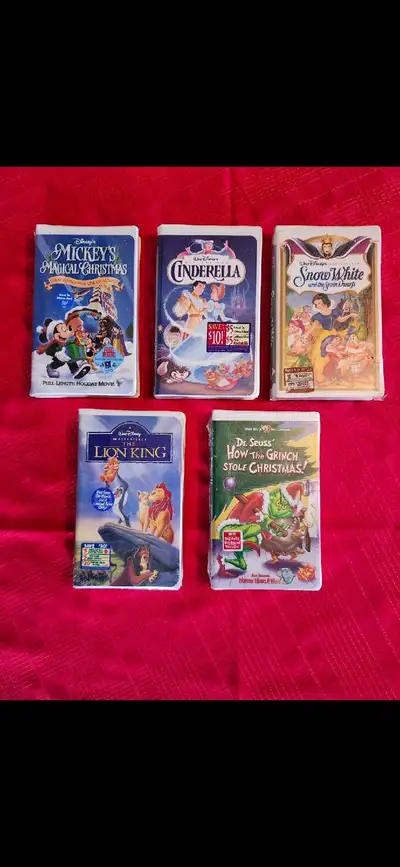 Various Disney VHS movie cassette sealed in clamshell. 1. Mickey's Magical Christmas - $10 (slight s...