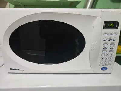 This Danby Designer microwave is in good, pre-owned condition and features a digital display with co...