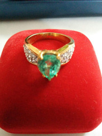 Emerald ring with diamonds