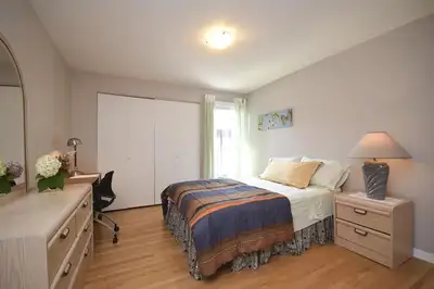 LARGE FURNISHED ROOM available for rent in three-bedroom townhome. This spacious home, highly rated...