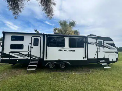 PRICE DROP $5,000, now $51,750. 2023 Imagine 3210BH travel trailer. 38 feet in length. Like new, onl...