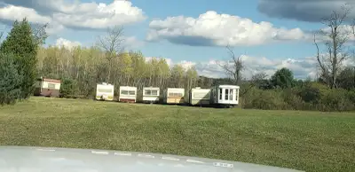 Private collection 80 camper trailers for storage parts tiny homes living etc etc from 10’-40’. All...