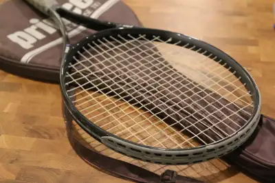 Prince Graphite Tournament Mid Plus, used. Needs to be restrung and needs new grip tape. Well mainta...