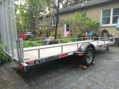EXCALIBUR atv/utility trailer with drive on ramp. This trailers been garaged its entire life since n...