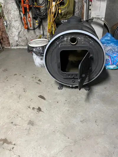 wood heaters built from steel barrels large med or small size 6 inch opening for pipe factory door a...