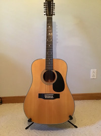 DM-12 Sigma acoustic guitar. 