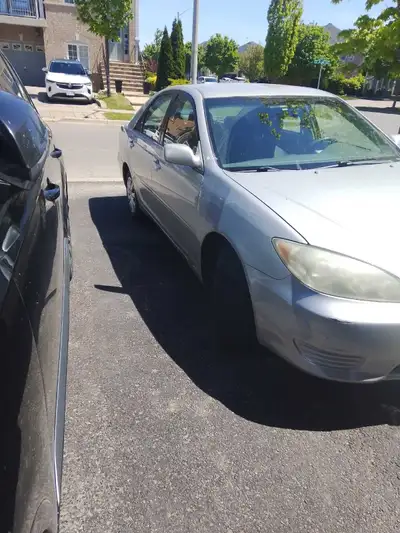 I'm selling my silver 2006 Toyota Camry LE, a reliable sedan known for its fuel efficiency and comfo...