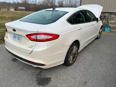 2013 Ford Fusion, selling for a friend who unfortunately can’t drive any more. 287K, I have a hoist...