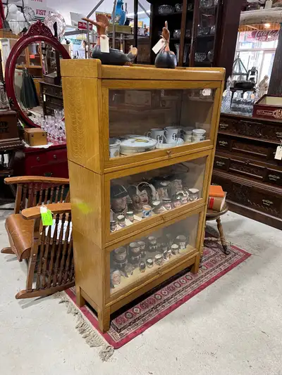 Really nice solid oak barrister bookcase. All the doors open nicely. Dimensions are in the photos As...