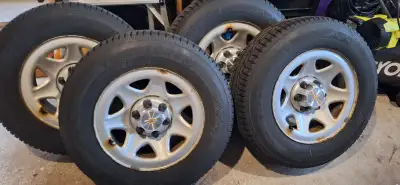 Firestone Winterforce 2 UV ( 4 tires/rims and hubcaps ) 9/32nds of tread life. Bolt pattern 6x5.5in....