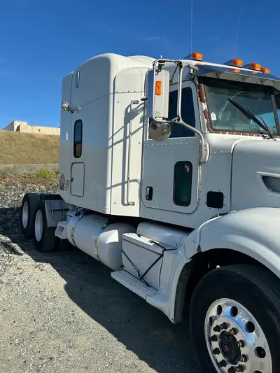 Peterbilt 386 with cat engine C15 475 horsepower 18 speed transmission and 46 rear any more info cal...