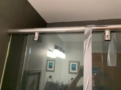Selling glass sliding doors for bathtub, comes with track and handle, used like new no damage, 3 pie...
