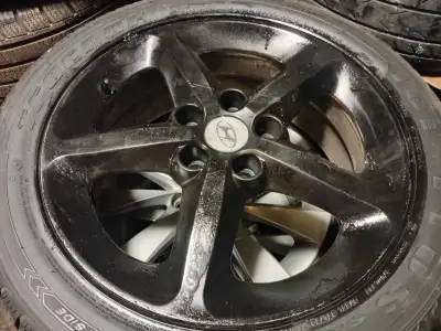 Selling Hyundai alloy rims with winter tires size 235/45/17 lots of tread dot 2022