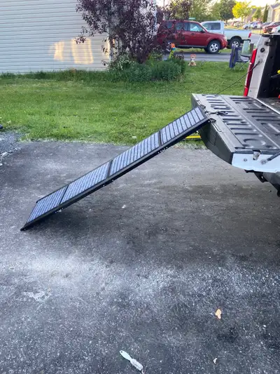 71 Inches long, carpeted and foldable dog loading ramp. Used once for our 95 pound dog (RIP). Purcha...