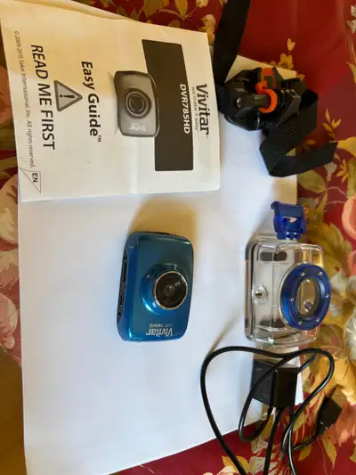Vivitar DVR785HD Mini Sport Digital Video Camera, waterproof with 2-Inch LCD with 32GB memory card....