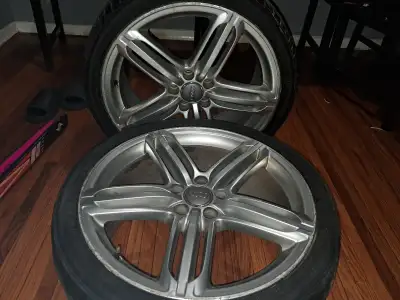 Selling a set of Audi rims with tire . They have some wear and tear, as shown in the pictures. all o...
