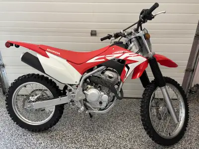 2021 Honda CRF250f, fuel injected, electric start, adult owned, only trail driven, approximately 10-...