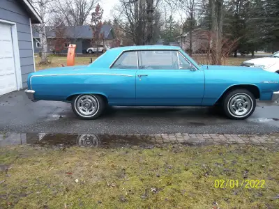 Removed from 1965 Acadian Beaumont at 68000 miles. Complete.