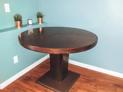 Round wooden dining table without chairs! This was in our basement and it was barely used! Really go...